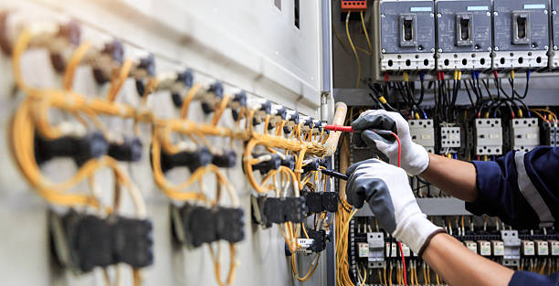 Professional Electrician technician working in Mims, FL